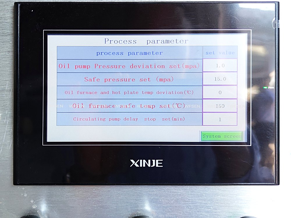 Touchscreen HMI of a WFSEN hot press showing pressing parameters