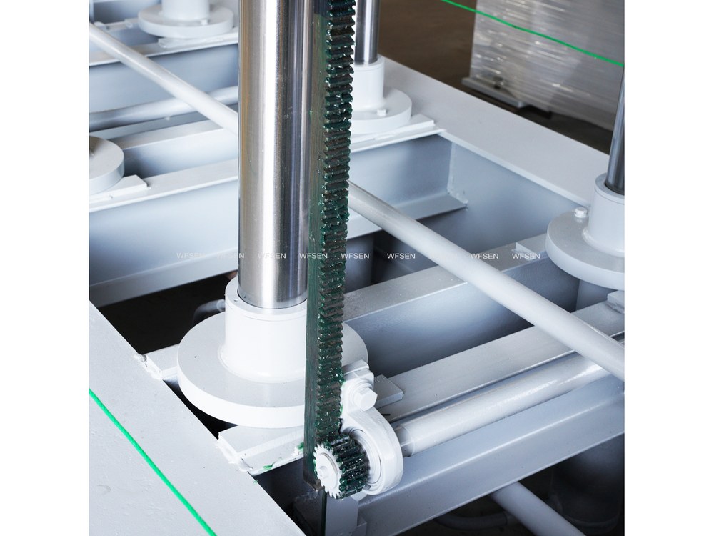 Hydraulic cylinder and platen mechanism underneath a multi-layer hot press