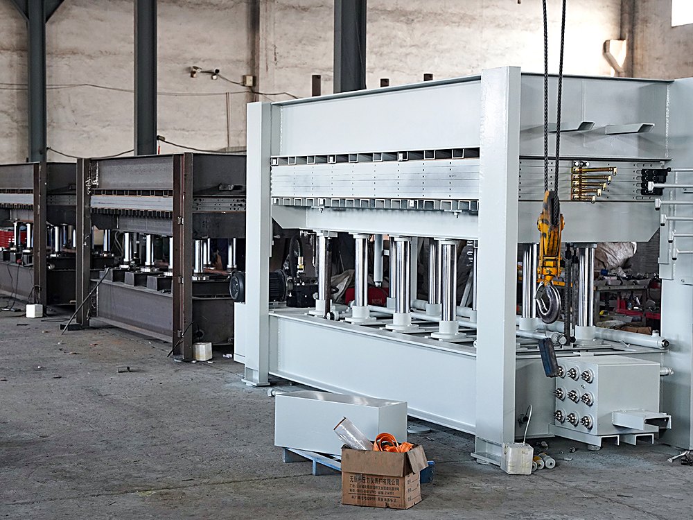 Multiple WFSEN multilayer hot presses installed in a wood panel factory