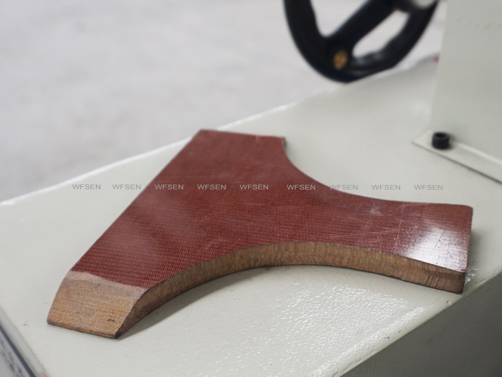 Curved laminated wood part used to verify the glue film on shaped components